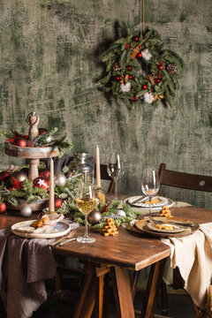 New Year's or Christmas table. The table is covered with food. 2021