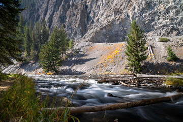 Flowing Firehole River in Yellowstone National Park. Silky water daytime long exposure