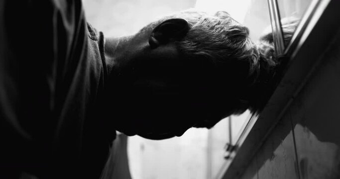 Old man in desperation feeling like giving up, black and white
