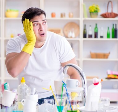 The Man Frustrated At Having To Wash Dishes