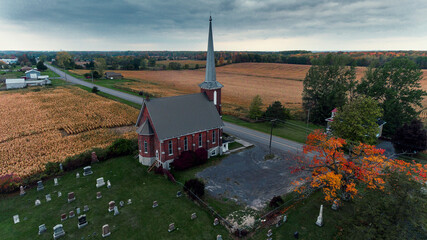 Cold air landscapes of rural scenes depicting barns and abandoned homes in fall colour settings around the South East of Ontario Canada in The Greater Napanee and Stone Mills township.