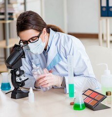 Lab chemist checking beauty and make-up products