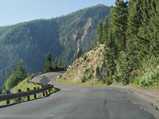 Dangerous twist and turn around breathtaking cliffs at the Grand Loop of Yellowstone National Park in Wyoming, USA.