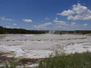 Breathtaking view of the fountain Paint Pot at Lower Geyser Basin, with clear skies at Yellowstone National Park, Wyoming.