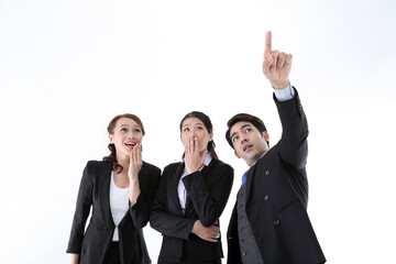 Southeast Asian young office business man woman wearing suit point finger showing up expressions surprise wonder wow on white studio background