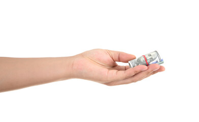 A hand holding a dollar bill in front of a white background makes a gesture of giving