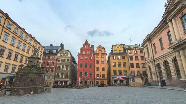 Stockholm Sweden time lapse 4K, city skyline night to day timelapse at Gamla Stan old town and Stortorget