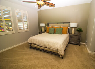 Master Bedroom With Bed, Nightstands And Lamps