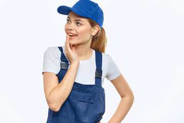 Woman in working uniform blue cap delivery courier delivery service