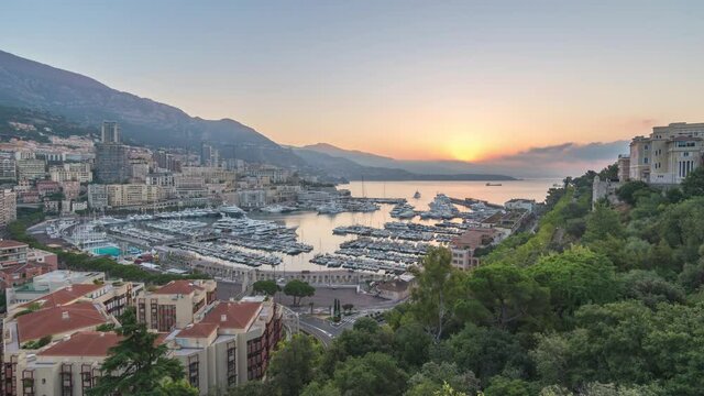 Monte Carlo Monaco time lapse 4K, city skyline night to day sunrise timelapse at Ville port
