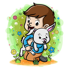 A boy playing with rabbit in the garden
