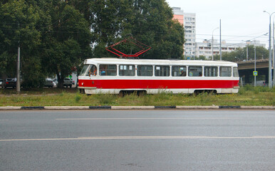 Fototapeta na wymiar the tram is moving on a suburban route
