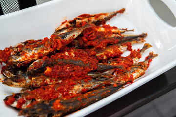 Fried fish with chili sauce Indonesian or Asian food
