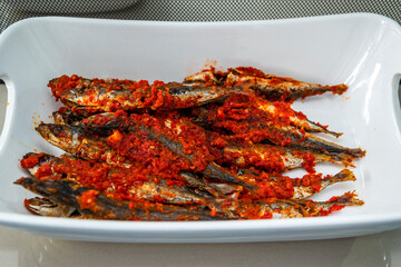 Fried fish with chili sauce Indonesian or Asian food