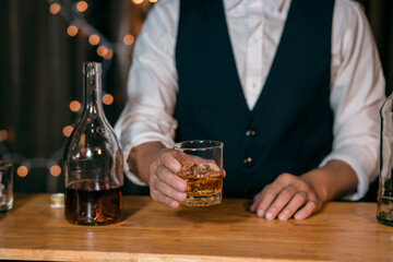 Barman pouring whiskey whiskey glass beautiful night