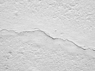 concrete floor or wall painted white with cracks are long crooked line