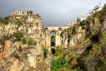 Foto op Plexiglas Ronda Puente Nuevo Puente Nuevo in Ronda, Spain spans the 120m deep chasm which divides the city.