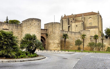 Fototapeta na wymiar Gate of Almocabar in the Arab walls of Ronda, Malaga, Andalusia, Spain