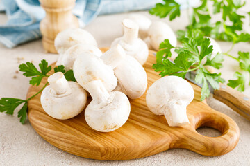 Fresh raw white champignon mushrooms