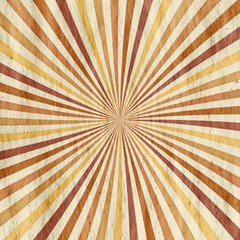 retro sun rays on old grunge paper