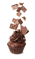 Tasty cupcake and falling sweet chocolate on white background