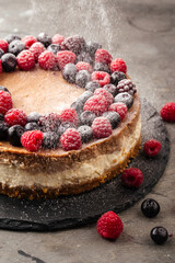 Two-layer cheesecake decorated with berries
