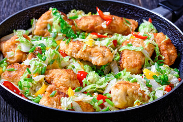 sesame chicken with chinese cabbage, top view