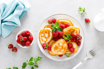 Breakfast pancakes with fresh raspberry