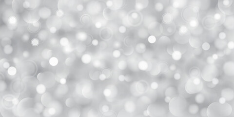 Abstract background of big and small translucent circles in gray colors with bokeh effect