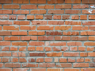 brutal red brick wall with cement the stitches for the background