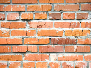 Obraz premium brutal red brick wall with cement the stitches for the background