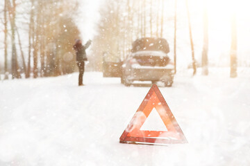 Fototapeta na wymiar Man and car. Winter walk and car repair.