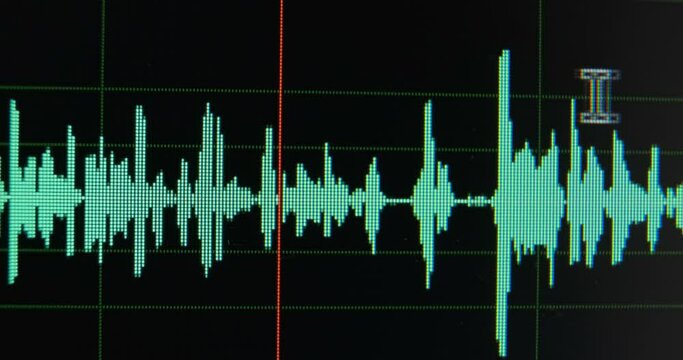 Sound producer moves sound track along timeline working on new project in computer program macro view