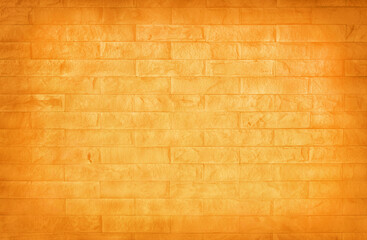 Gradient orange brick wall texture background, pattern of vintage style slate stone for design art work.