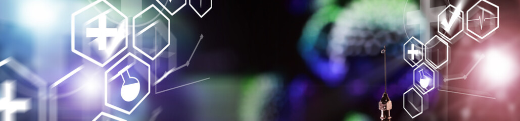 Medical syringe with a needle and a cure for the virus. A drop of drug flows down the needle....