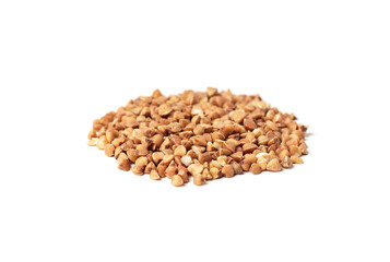 Pile of buckwheat groats isolated on white background close-up