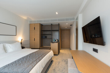 Interior of a luxury master bed hotel bedroom