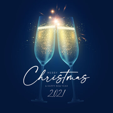 Merry Christmas and Happy New 2021 Year background with champagne glasses, lights and bokeh effect.