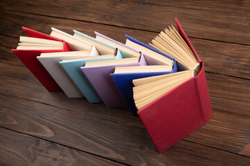 Arrow Shape made of books love to wisdom, science and education. Reading and writing concept