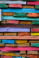 Wood planks painted in various colors.
