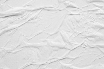 Blank white crumpled and creased paper poster texture background