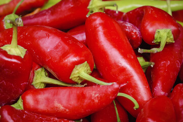 Bell pepper and chili pepper background and close-up.