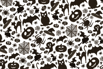 Abstract halloween pattern in cartoon style on white background. Paper art. Happy hallowen holiday concept
