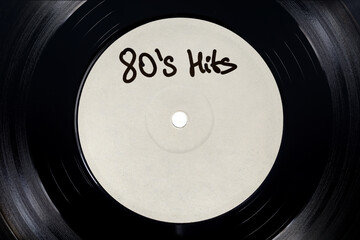 White label of LP vinyl record with 80's Hits text.
