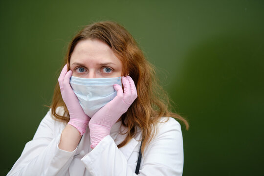 Frustrated Doctor In Medical Mask In School Class, Copy Space. School Education During The Coronavirus Epidemic