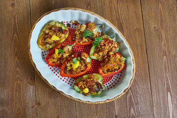 Stuffed red bell peppers with ptitim