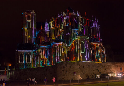 LE MANS, FRANCE - AUGUST 28, 2016: Night of chimera Illuminated perfomance on the wall of Roman and gothic cathedral Saint Julien at Le mans Sarthe, Pays de la Loire