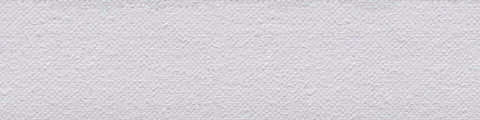 Linen canvas background in classic white color as part of your elegant design look. Seamless panoramic texture.