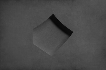 Abstract, geometric shape on gray surface