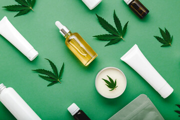 Hemp cbd oil serum in glass dropper bottle with cannabis leaves, Moisturizing cream, Serum, lotion,...